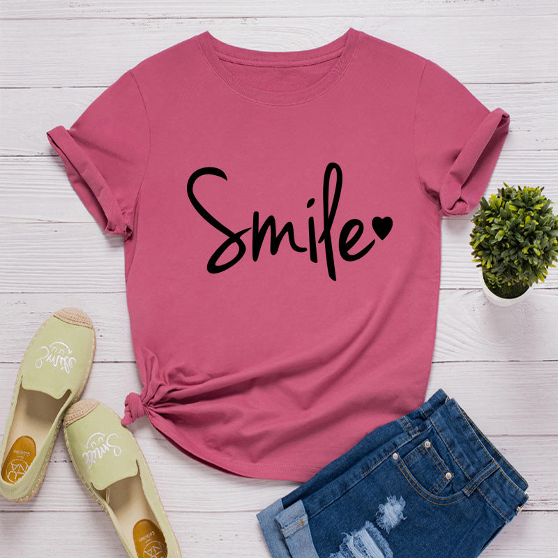 Camiseta con estampado de sonrisa en forma de corazón, manga corta, cuello redondo, corte ancho y cómodo, ideal para un look casual y relajado