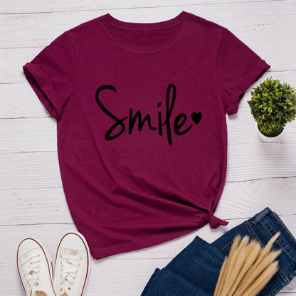 Camiseta con estampado de sonrisa en forma de corazón, manga corta, cuello redondo, corte ancho y cómodo, ideal para un look casual y relajado